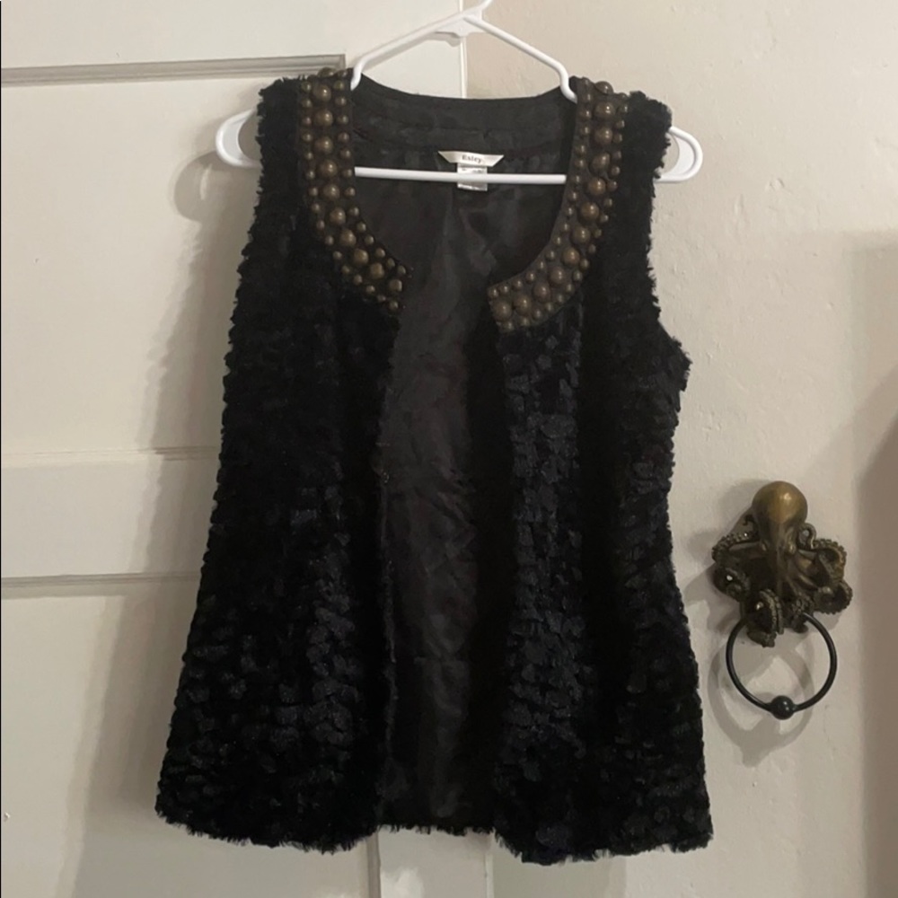 Beautifully textured black vest. It’s super soft.
